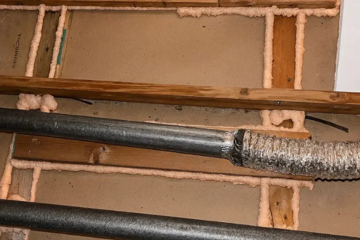 spray foam air sealing around ductwork completed by an insulation contractor in Charles Village to reduce air leakage