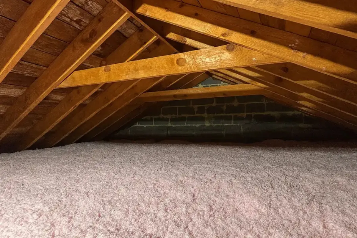pink blown-in attic insulation installed by an insulation contractor in Perry Hall to improve home efficiency